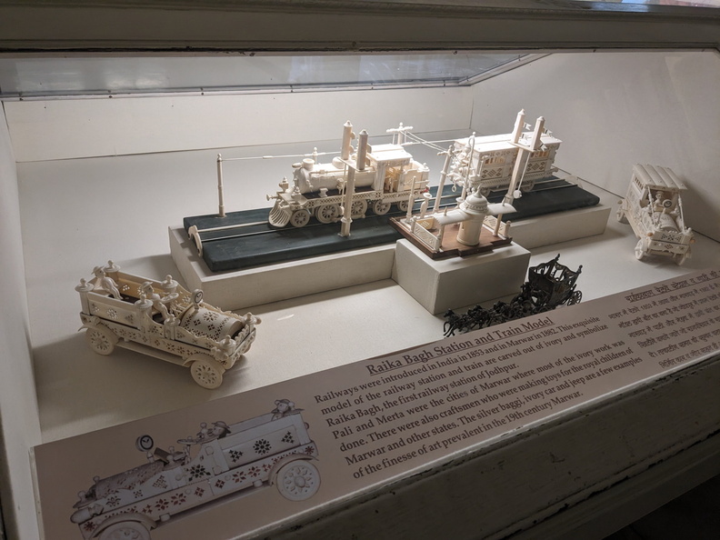 Ivory carvings of trains and cars