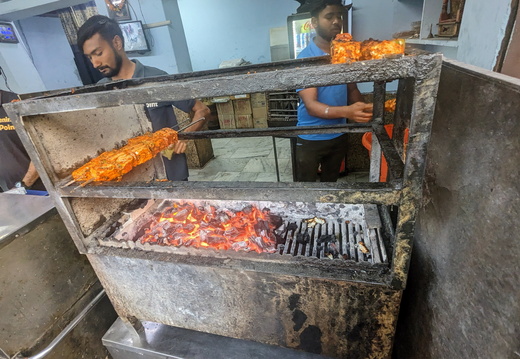 Restaurant workers grilling food