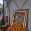 A religious image with marigold flowers