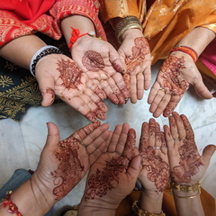 Henna designs on women's hands